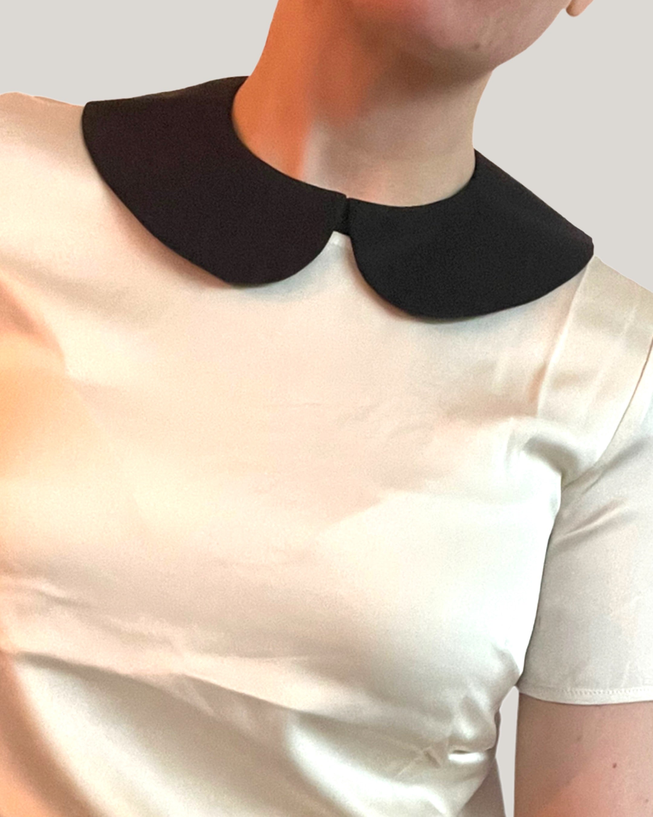 Krage Brigitte svart